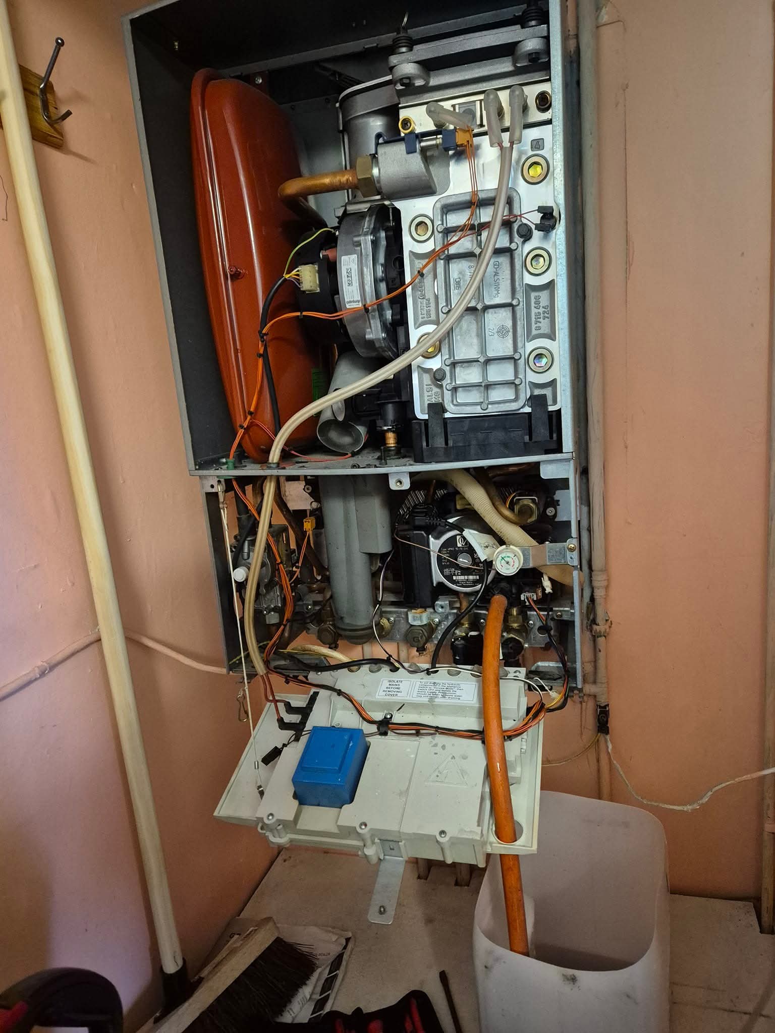 An older boiler with its casing off